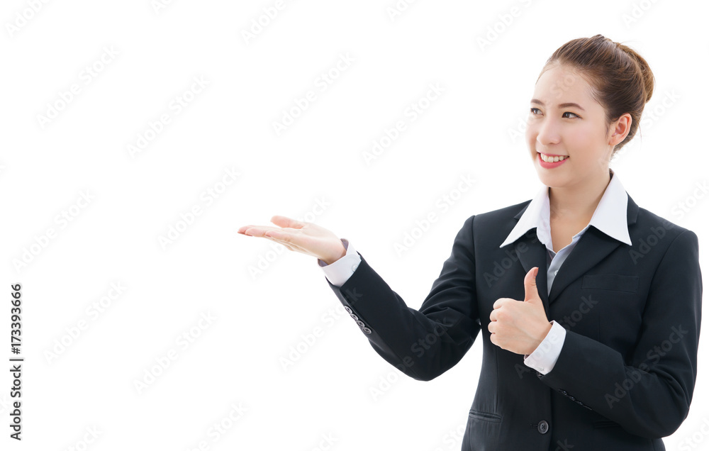 Young Asian businesswoman in black suit and white t-shirt , opening her hand and giving the thumbs-up for concept placing a sign or object , isolated on white background Young Asian businesswoman in black suit and white t-shirt , opening her hand and giving the thumbs-up for concept placing a sign or object , isolated on white background