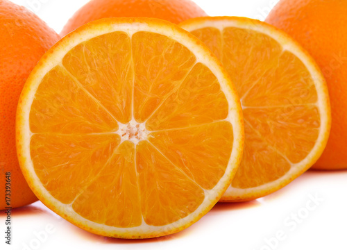 Orange fruit with half isolated on white background.