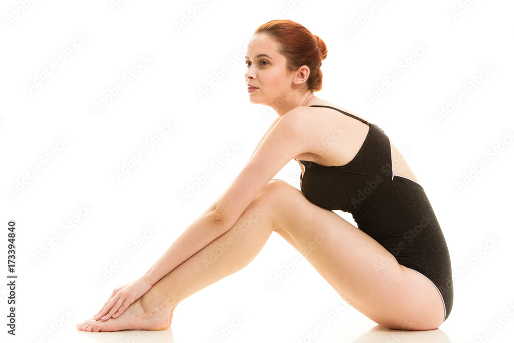 Sitting woman in underwear showing smooth legs Sitting woman in underwear showing smooth legs
