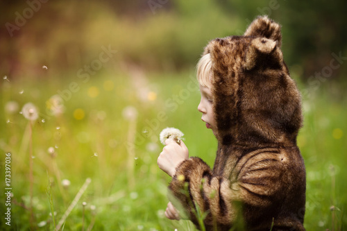Little girl in a bear costume