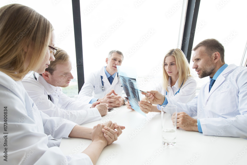 Fototapeta premium Group of medics with x-ray scan