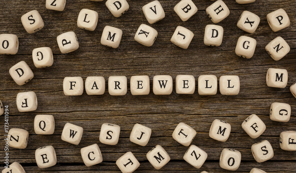 Word FAREWELL written on wood block Word FAREWELL written on wood block