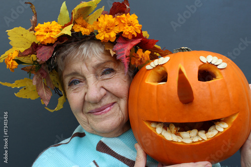 old woman with a pumpkin