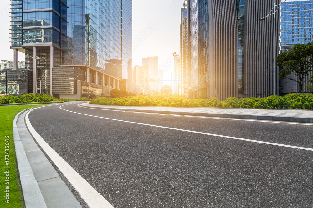 empty asphalt road front of modern buildings.