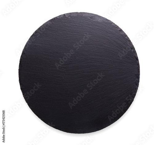 Empty rustic black slate stone plate isolated on white background