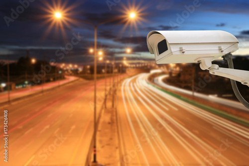 CCTV Camera on highway roads in twilight sky background.