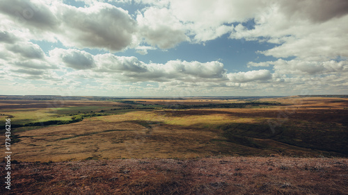 Fotografie View from high mountain to autumn boundless steppe