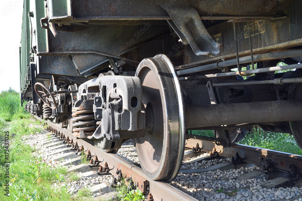 Wheels of a freight railway car close-up. Russia