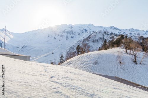  The snow mountains of Tateyama Kurobe alpine with blue sky background is one of the most important and popular natural place in Toyama Prefecture, Japan.