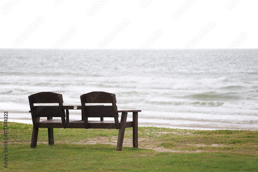 Old empty wooden chair on the lawn. Old empty wooden chair on the lawn.