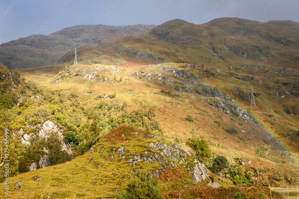 Fototapeta premium Rainbow over the lochaber hills,Scotland