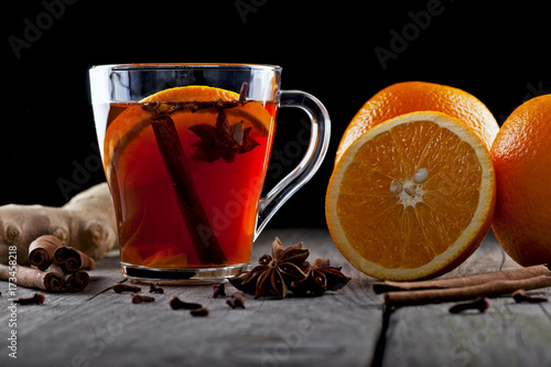 hot tea with spices and oranges