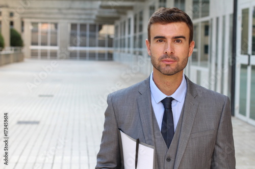 Classically good looking male isolated in office space 