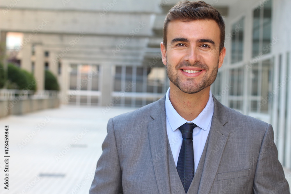 Good looking businessman isolated in office space Good looking businessman isolated in office space