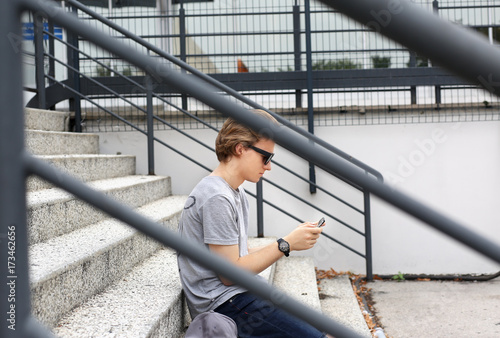 Attractive teenage boy in urban background