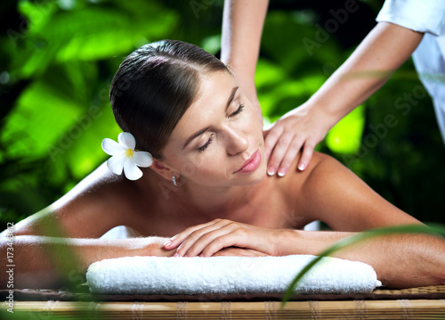 portrait of young beautiful woman in spa environment.  