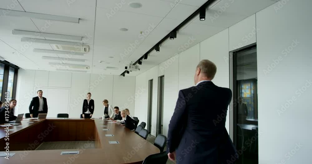 Businessman entering office meeting room