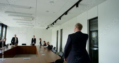 Businessman entering office meeting room