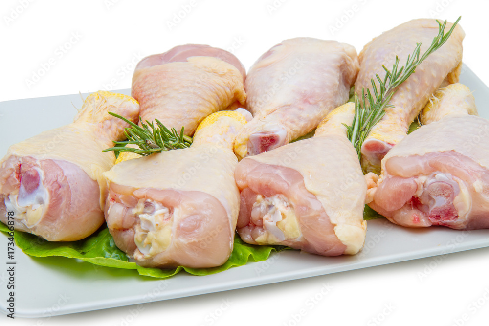 chicken thighs on white plate and white background