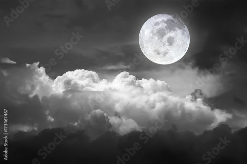 Dramatic atmosphere panorama view of beautiful sky and clouds in black and white.Element of Full moon image furnished by NASA.
