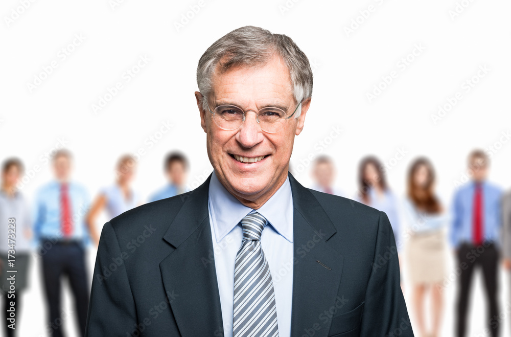 Businessman in front of a group of business people Businessman in front of a group of business people