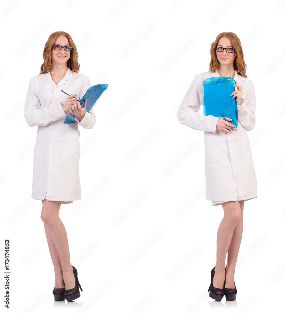 Pretty female doctor holding diary isolated on white