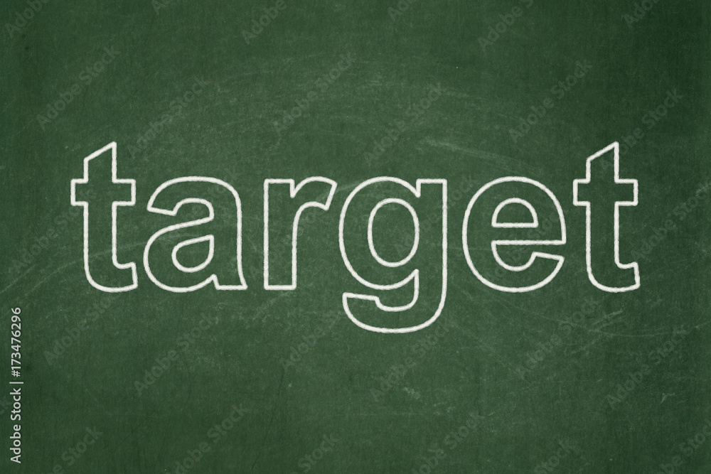 Finance concept: Target on chalkboard background Finance concept: Target on chalkboard background