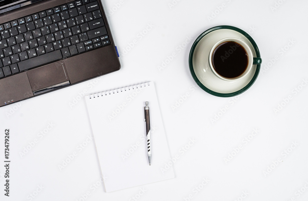 Business objects on a white background or desk. Business objects on a white background or desk.