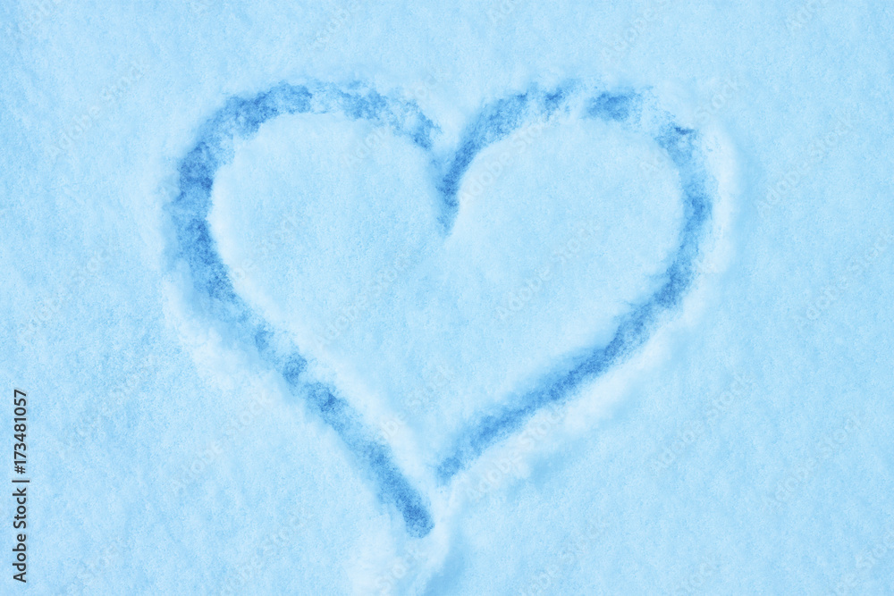 heart shape drawing on the snow