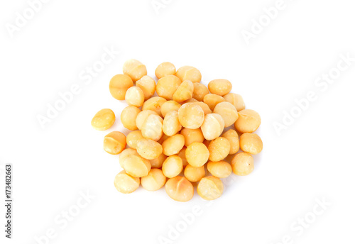 Roasted and salted Macadamia nuts on white background