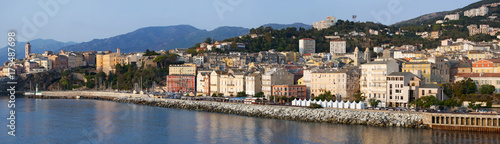 Corsica, 03/09/2017: lo skyline di Bastia, la città alla base del Capo Corso, vista dal porto principale dell'isola da cui partono e arrivano traghetti e crociere photo