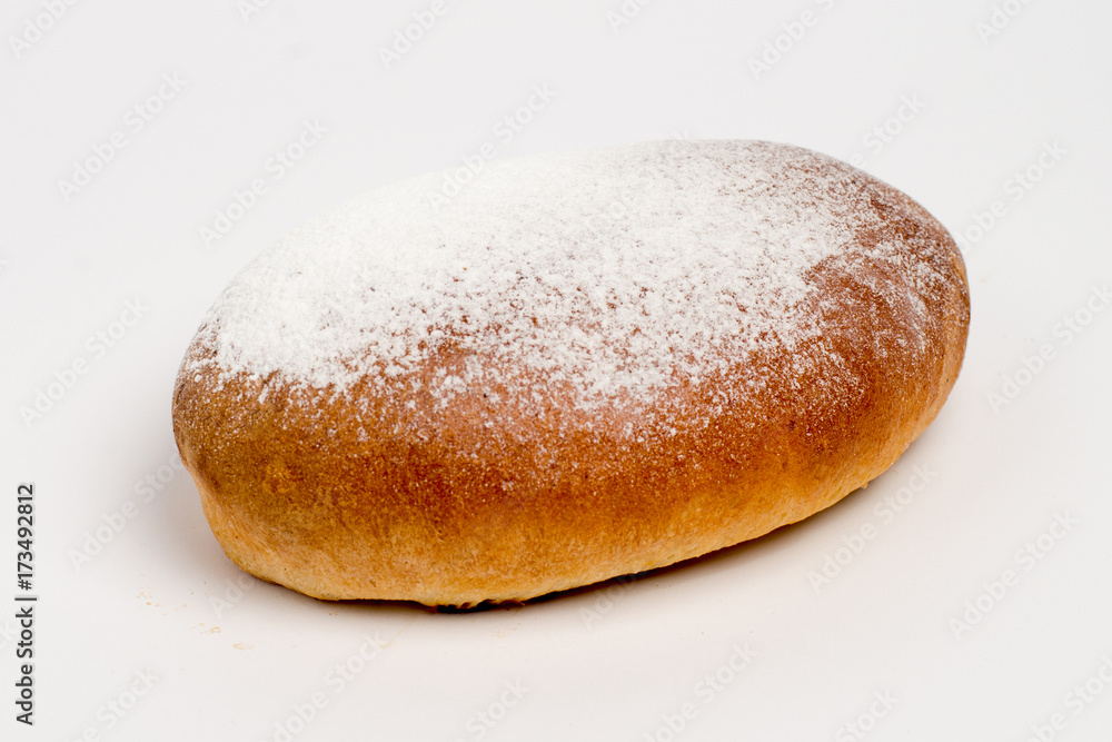 Sweet cinnamon bun roll swirl isolated over the white background