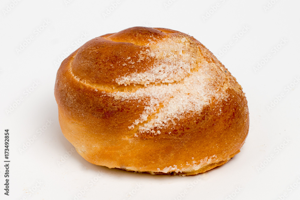 Sweet cinnamon bun roll swirl isolated over the white background Sweet cinnamon bun roll swirl isolated over the white background