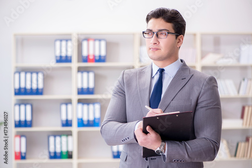 Young businessman working in the office