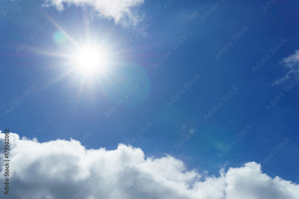 blue sky with clouds and sun for background. sun light shining over the clear sky and clouds. Beautiful and Amazing azure sky with clouds and sunshine for background