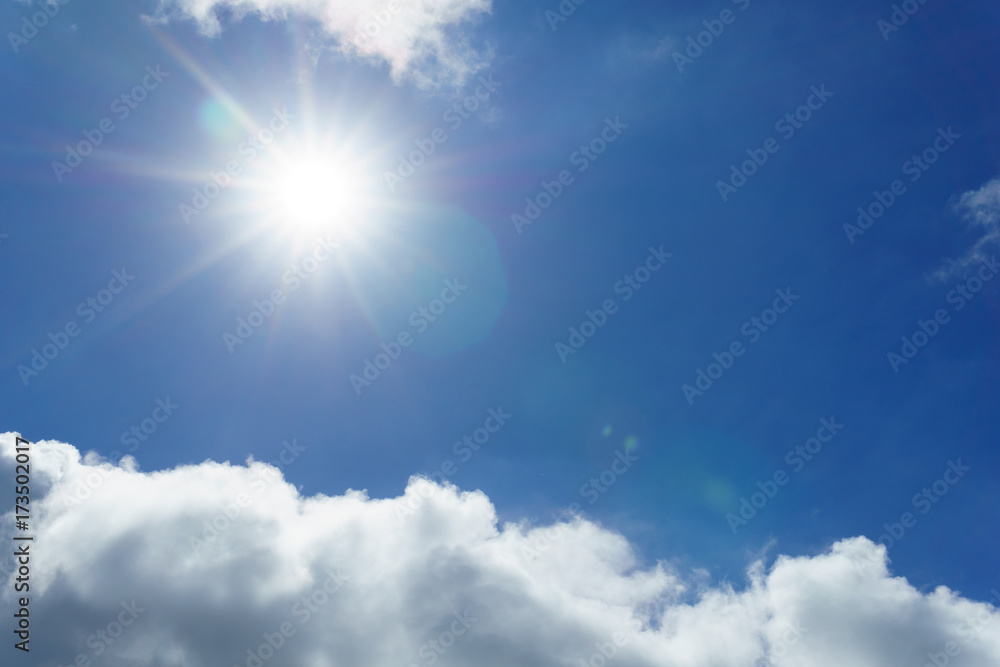 blue sky with clouds and sun for background. sun light shining over the clear sky and clouds. Beautiful and Amazing azure sky with clouds and sunshine for background