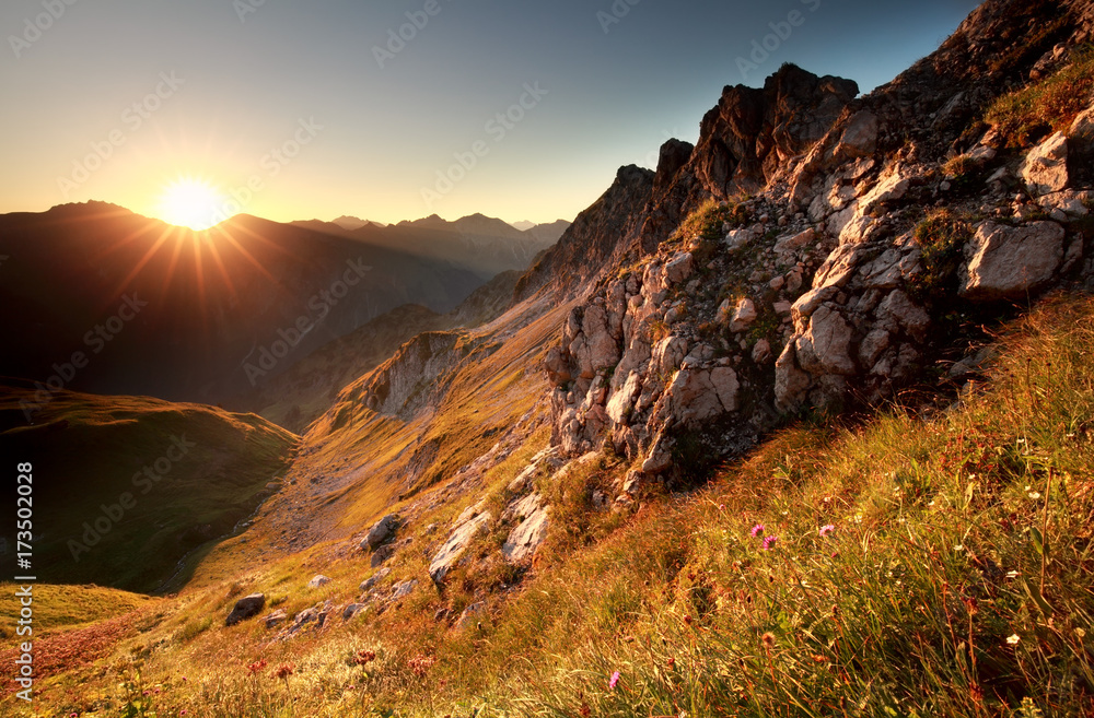 sunrise in mountains during summer