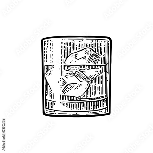 Whiskey glass with ice cubes. Vector vintage black engraving