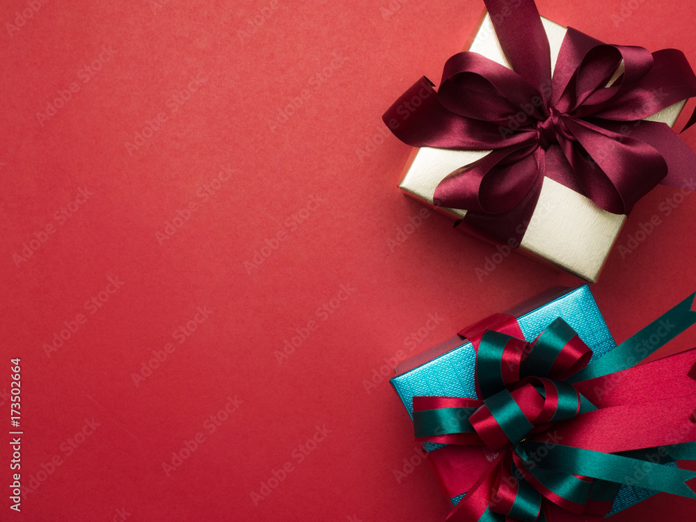 Valentine festival , New year Gold gift box with red ribbon. Red background for create idea copy space. Valentine festival , New year Gold gift box with red ribbon. Red background for create idea copy space.