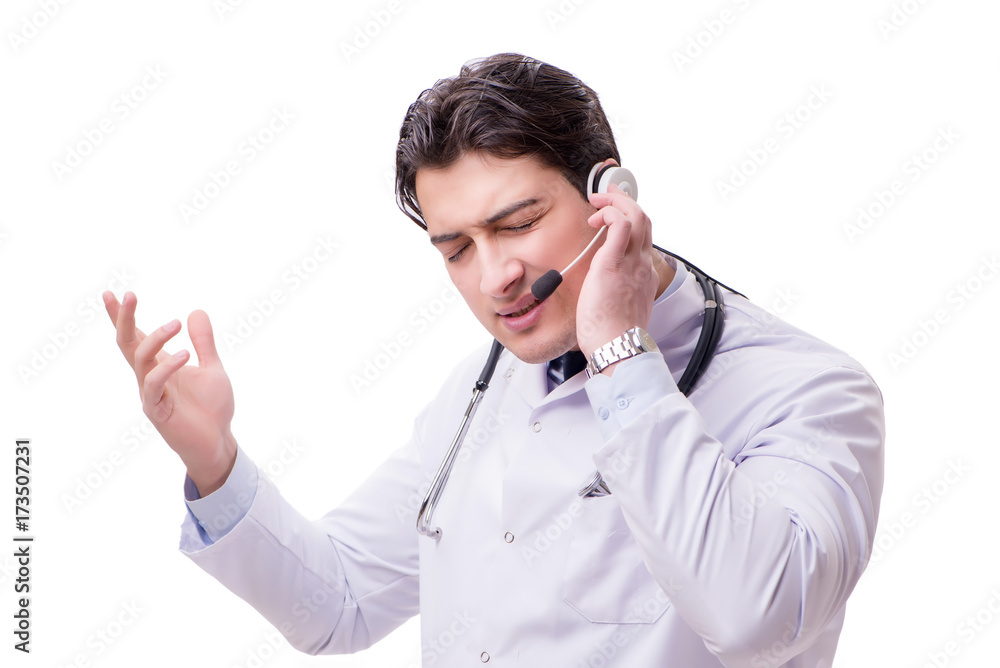 Young doctor with phone headset isolated on white Young doctor with phone headset isolated on white