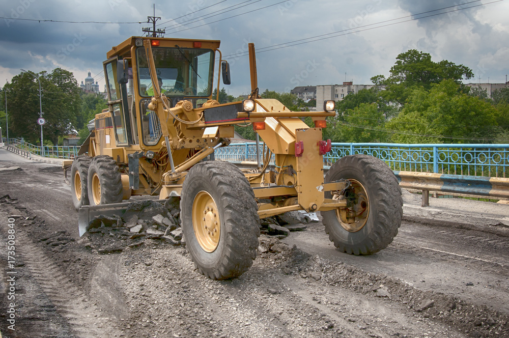 yellow grader driving yellow grader driving