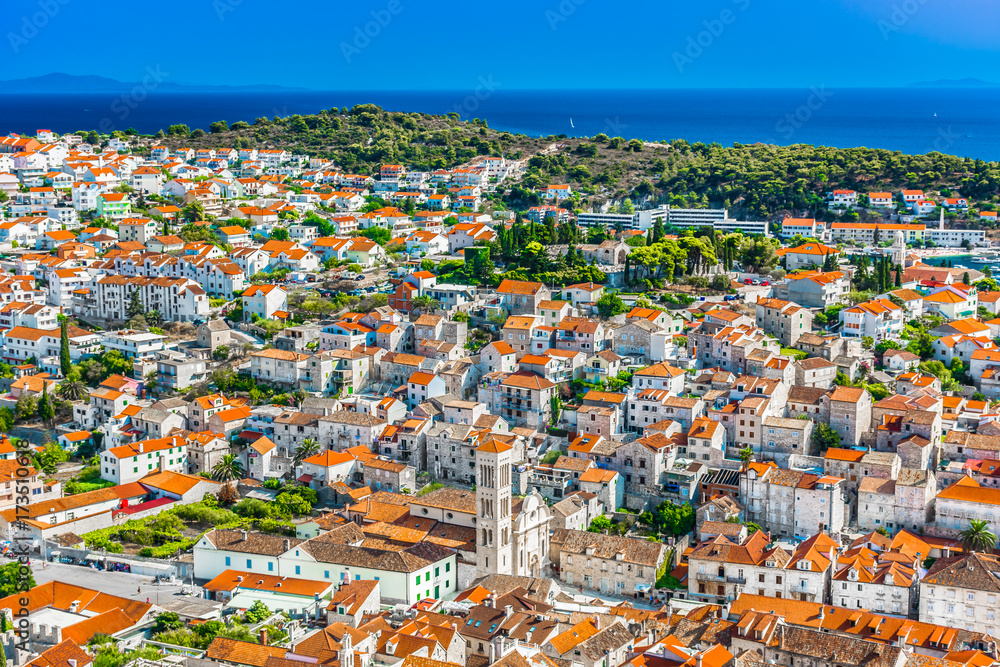 Hvar cityscape aerial scenery. / Aerial cityscape of old medieval town Hvar, famous travel resort in Europe, Croatia.