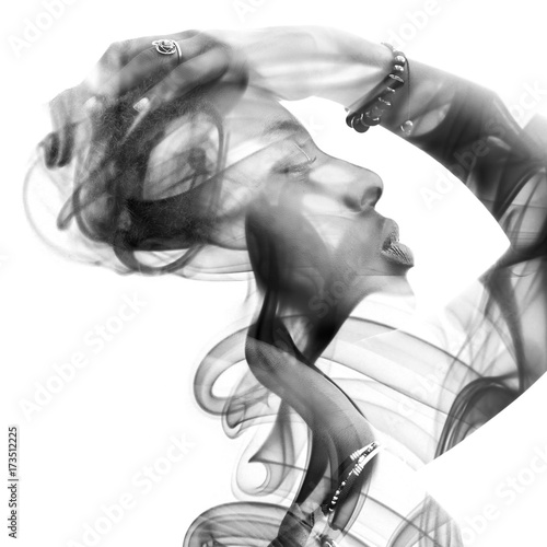 Photography Double exposure portrait of a sexy dark skinned woman and a smoky texture interw
