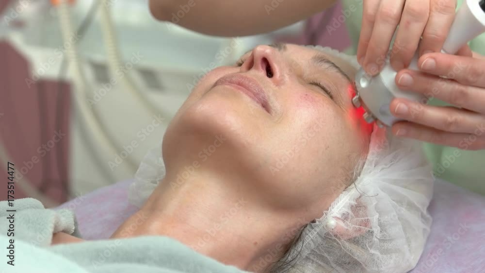 Rf skin tightening, mature woman. Adult female at the cosmetologist. Rf skin tightening, mature woman. Adult female at the cosmetologist.