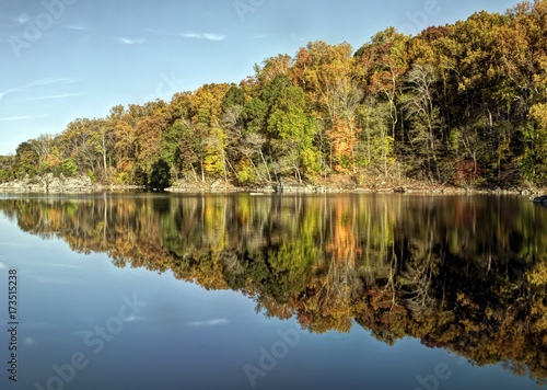 Fototapeta Naklejka Na Ścianę i Meble -  Colorful Autumn Foliage Reflected in Water