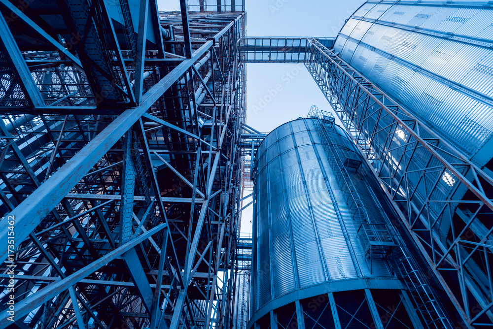 Modern silos for storing grain harvest. Agriculture. Modern silos for storing grain harvest. Agriculture.