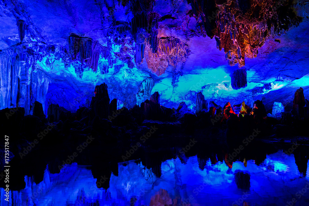 Illuminated lake in Reed flute cave in Guilin, China.