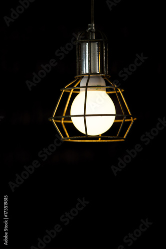 Old light bulbs in the darkness close up.