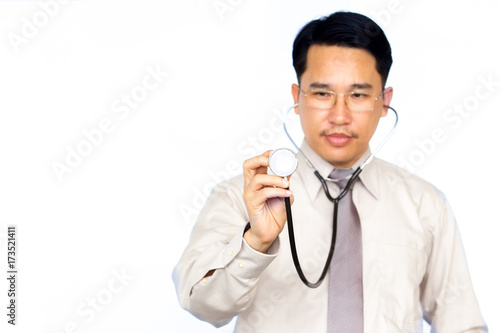 Asian doctor showing stethoscope on white background.
