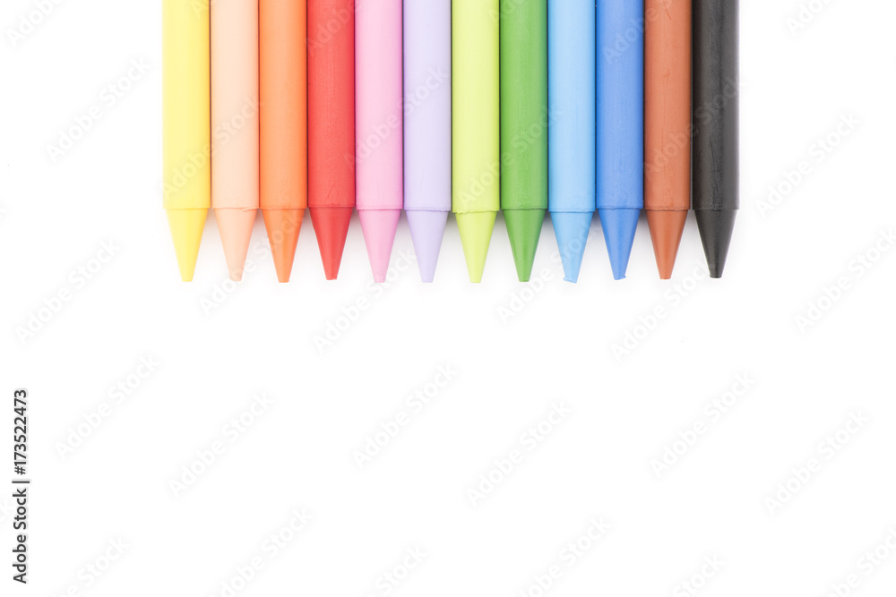 Group of colored crayons on white background top view Group of colored crayons on white background top view